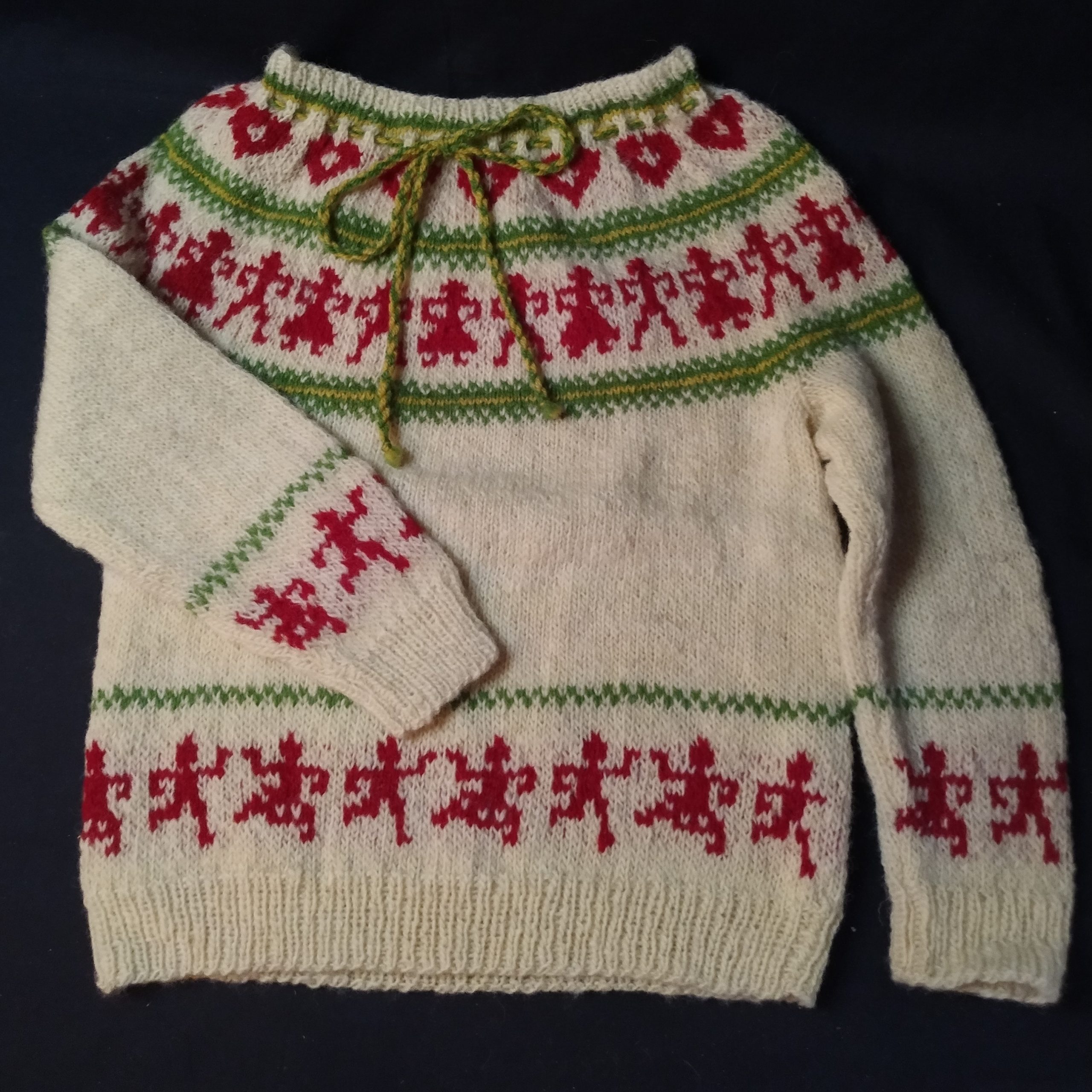 Wollen poppetjes-trui